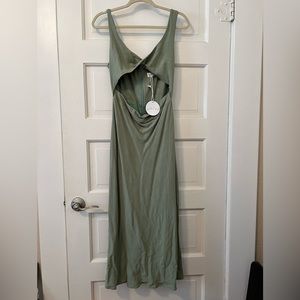 Petal + pup midi dress- twist front and open mid section. Never worn size US 6